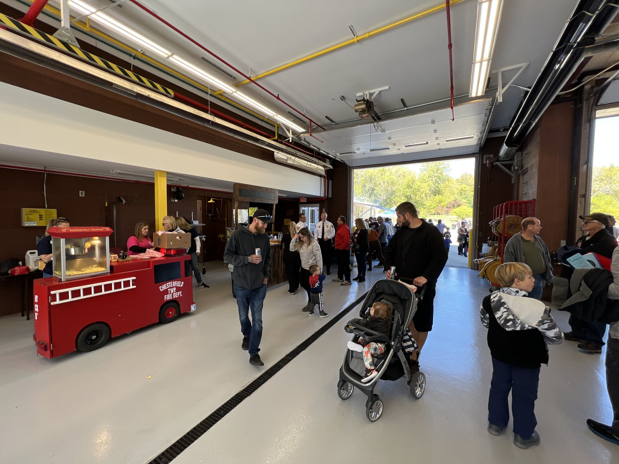 Residents filling the Station 3 apparatus bay at the Open House