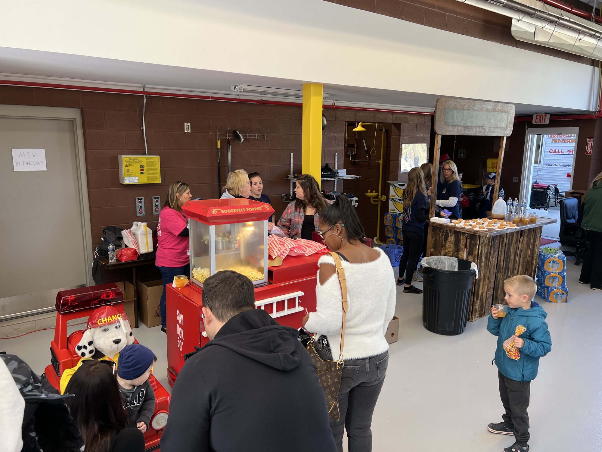 The fire truck popcorn cart and a Sparky figure in the bay