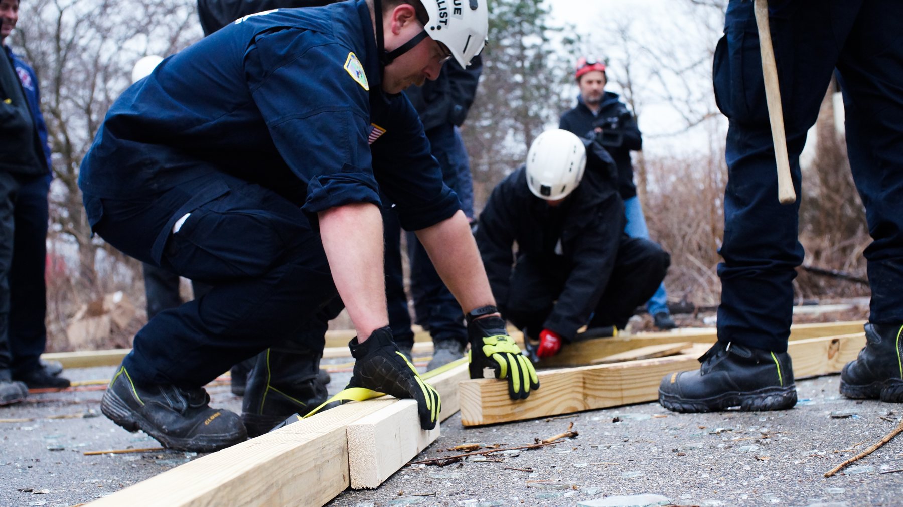 Rescuers building cribbing during collapse training