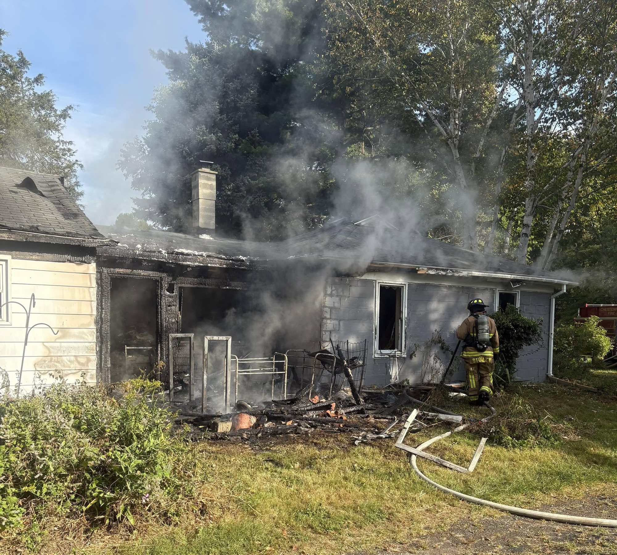 Crews working a house fire