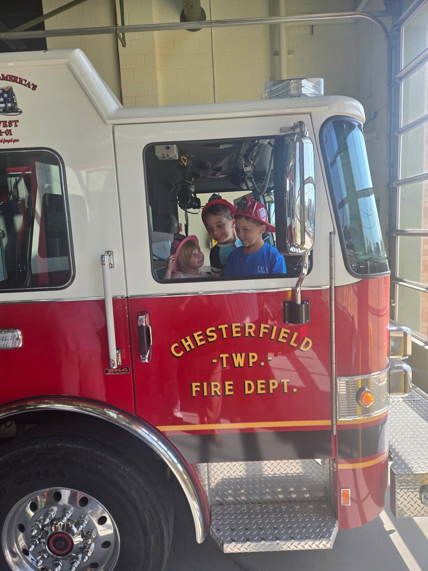 Children in the cab of a Chesterfield fire engine