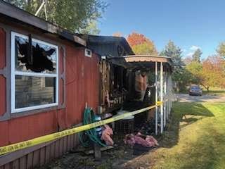 Fire damage along the side of the mobile home