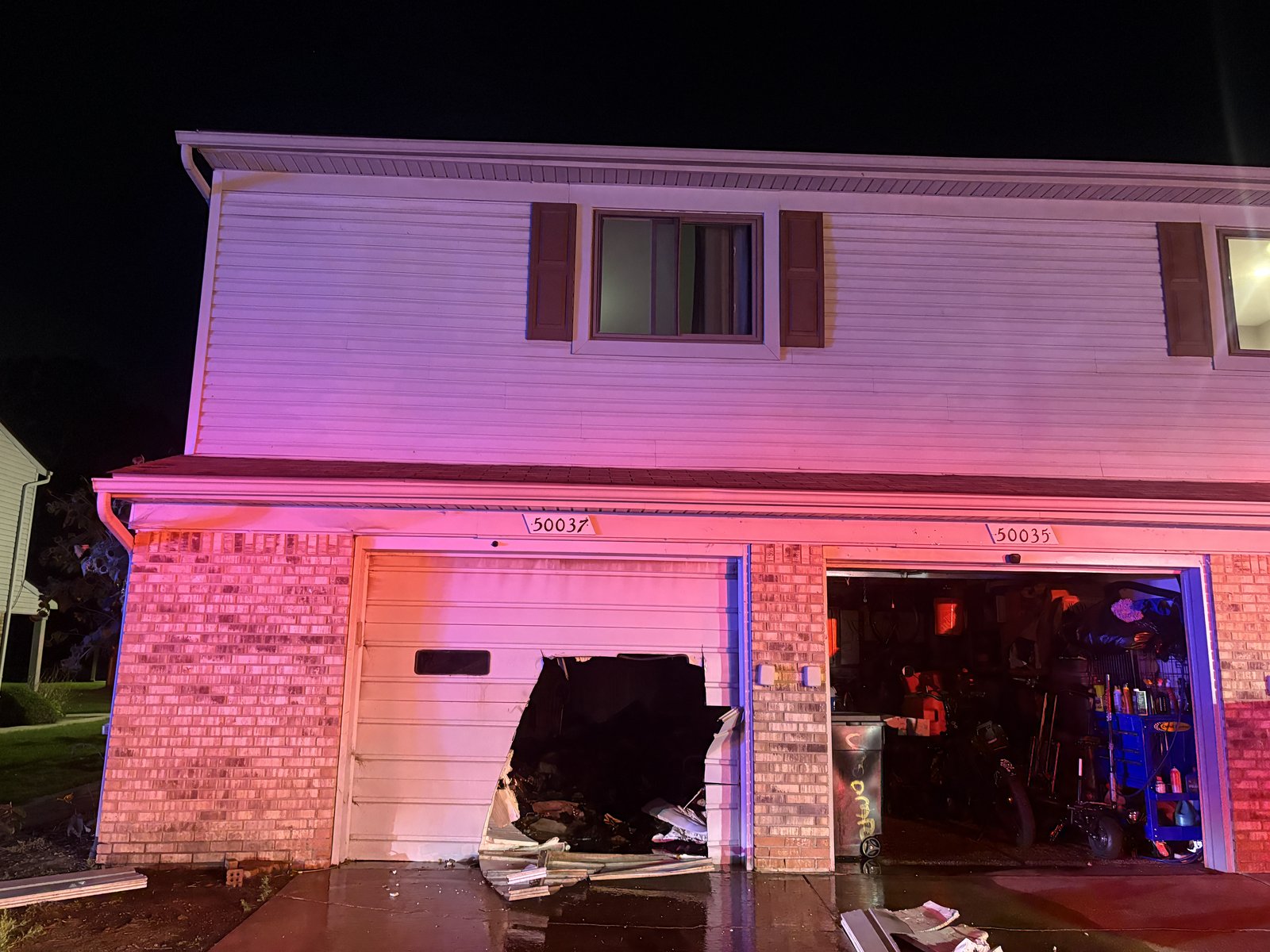 The condominium on S. Jimmy Court with its garage door forced open