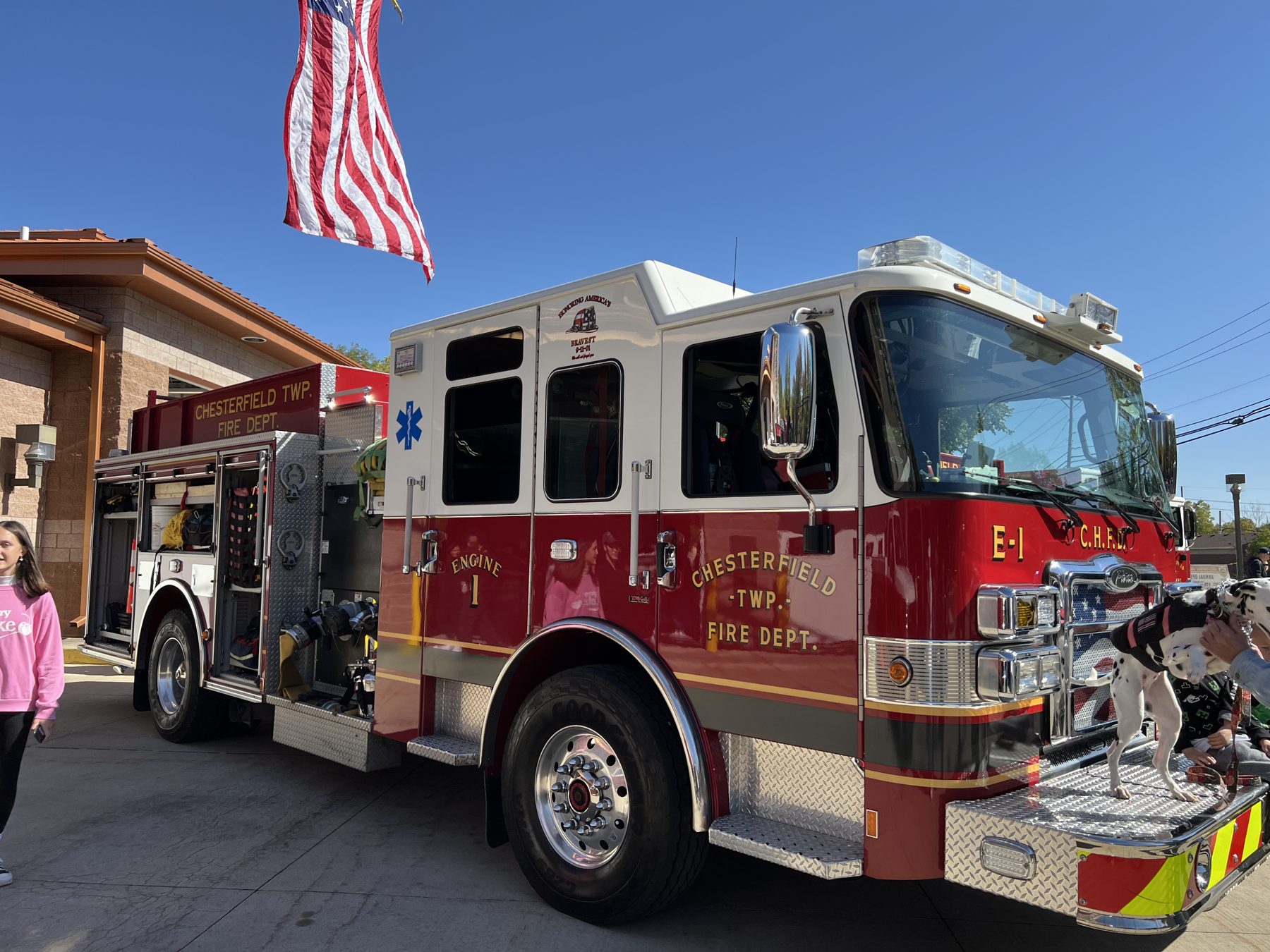 Engine 1 on display under the American flag