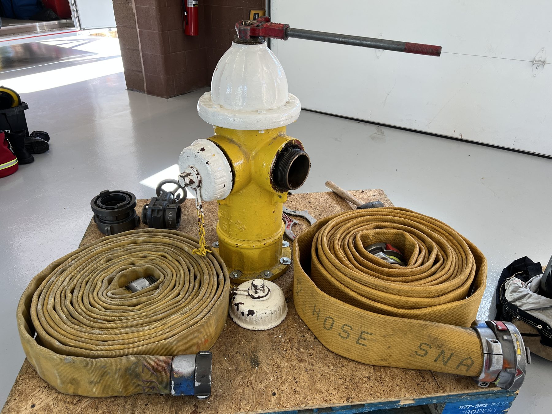A hydrant and fire hose display