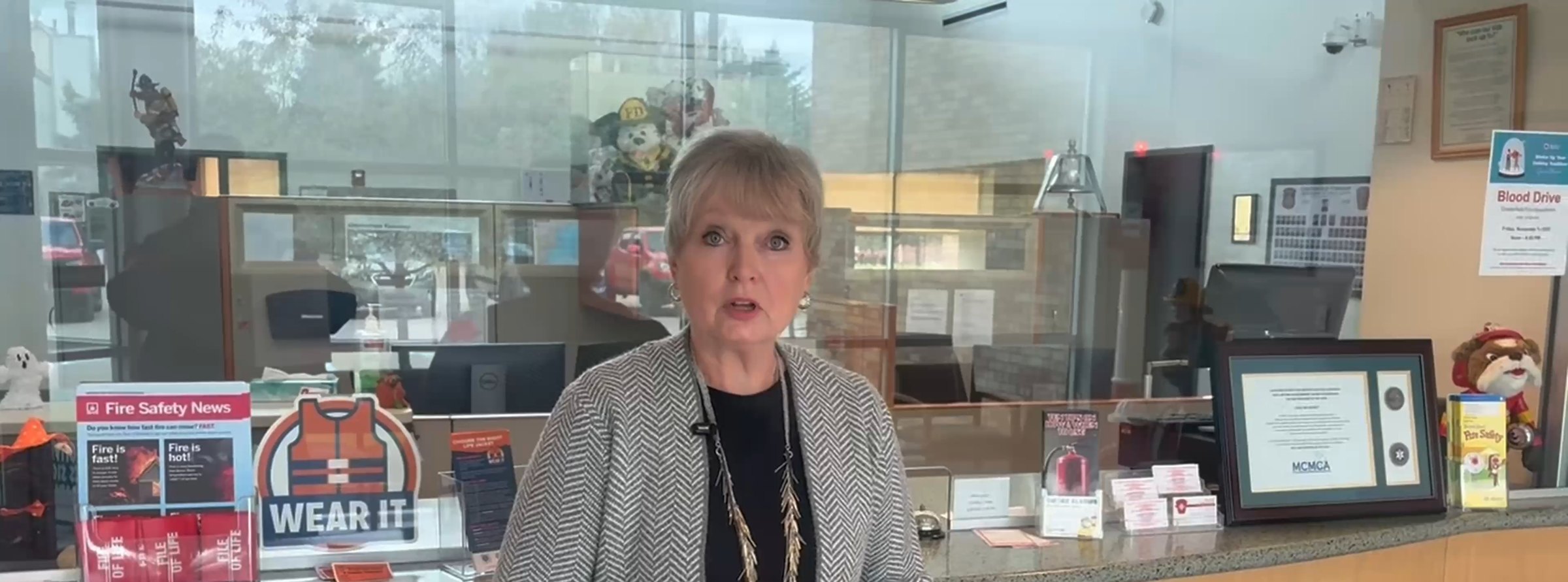 Peggy Crawford at the Records window in the Station 3 lobby