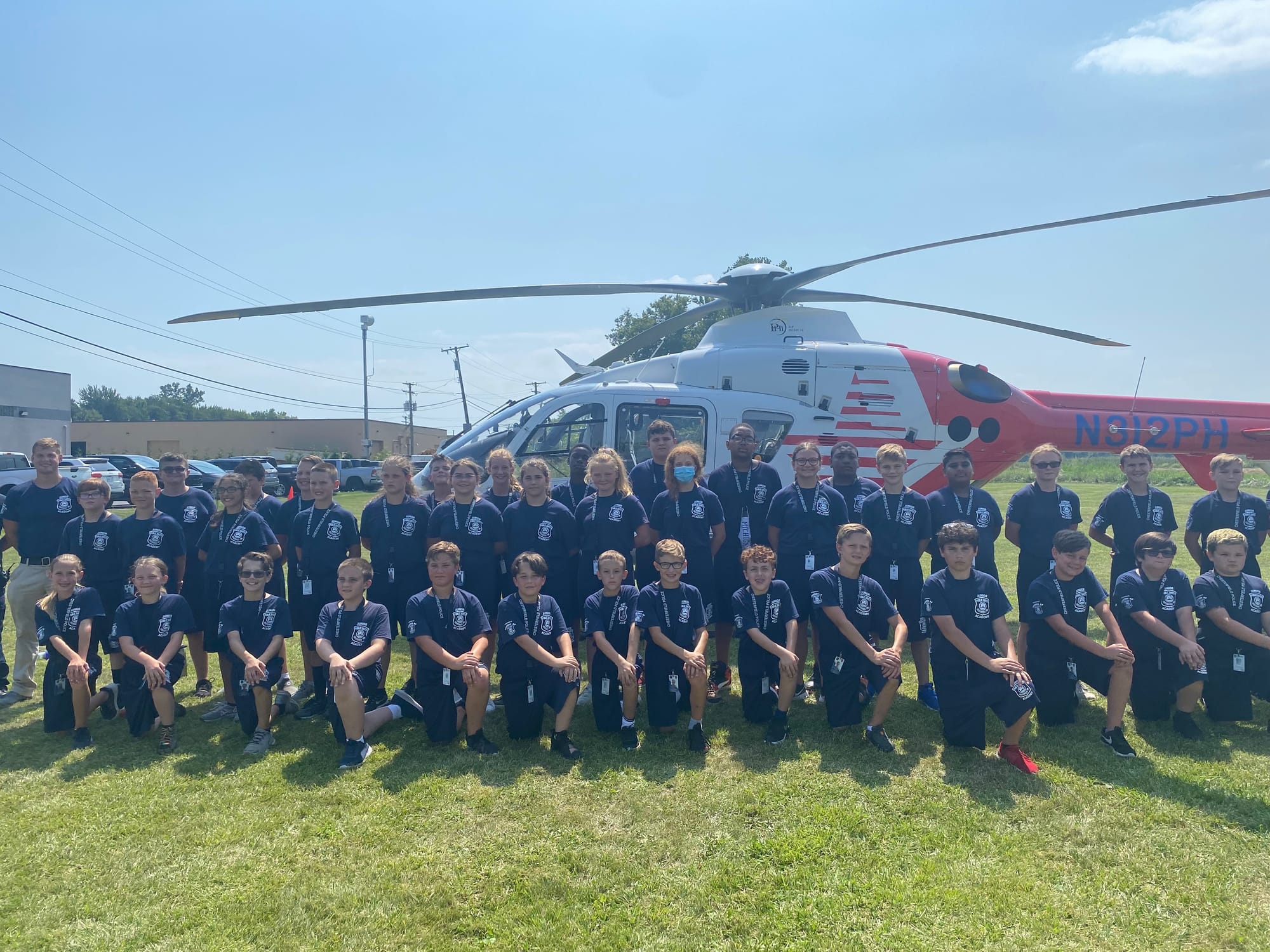 The academy class with a medical helicopter
